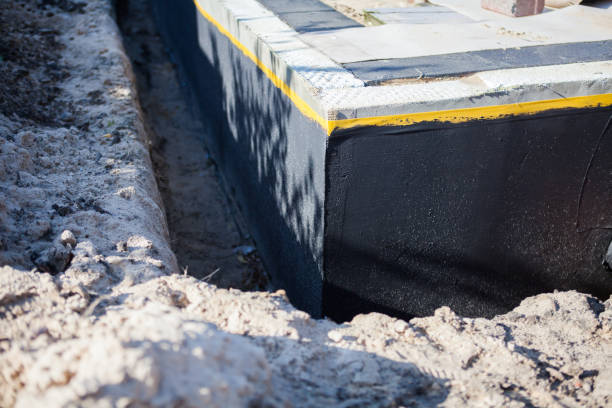 Professional Emergency Waterproofing technician working in Beachwood, NJ